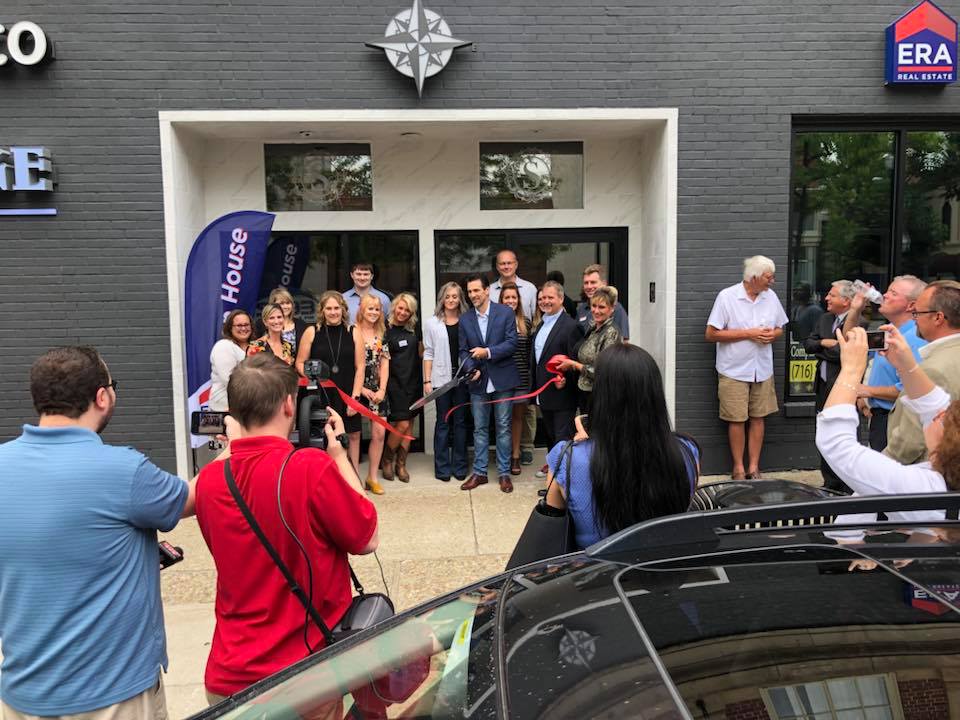 ERA Team VP, Lynn Development, and other local businesses cutting the ribbon for the opening of the revitalized Spain Building